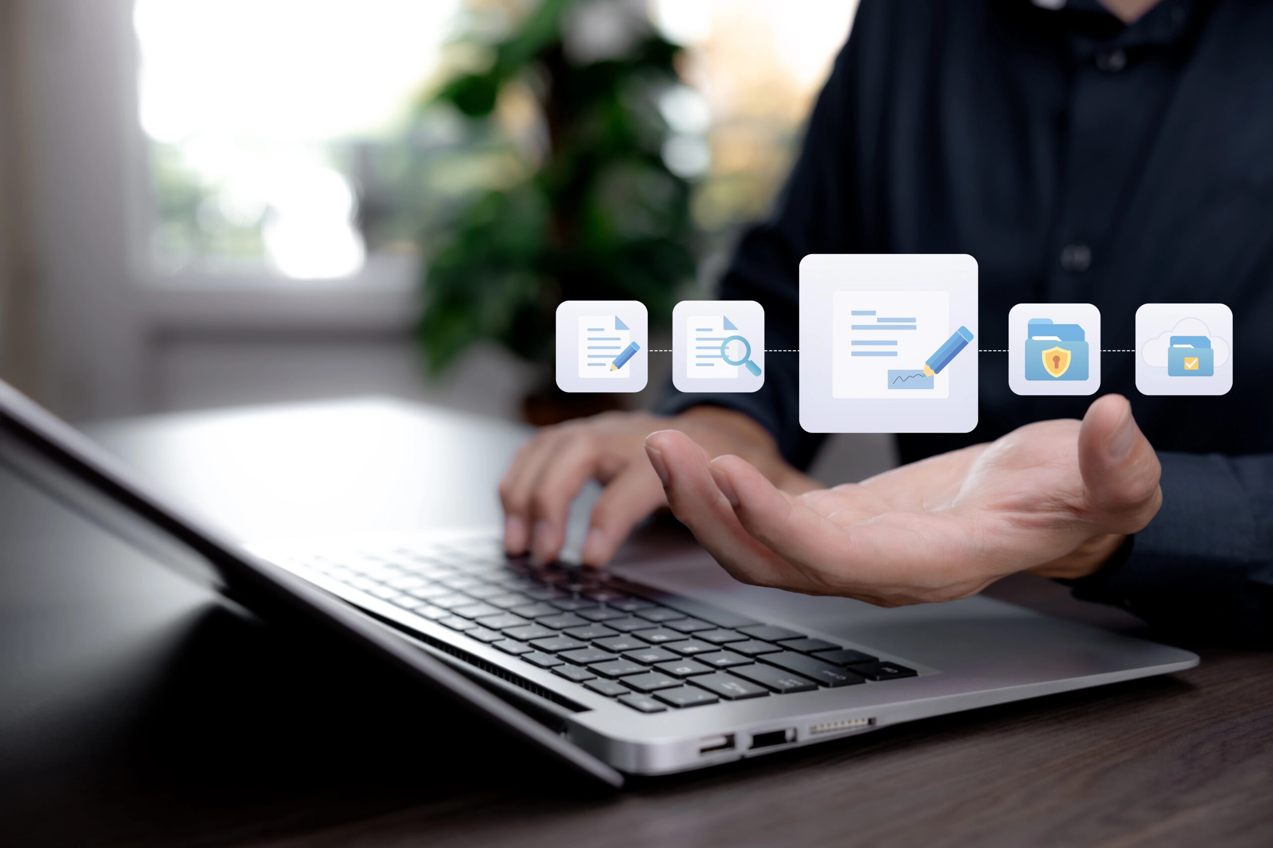 Abbild eines Mannes am Laptop der seinem digital Workflow nachgeht, um digitale Unterschriftsprozesse nachvollziehbar zu gestalten
